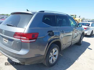 2018 Volkswagen Atlas SE with VIN 1V2CR2CA2JC576397, listed as a IAAI auction lot 41959708 with 168,619 mi miles and . Bid and sale history available at DreamBid. Image 4.