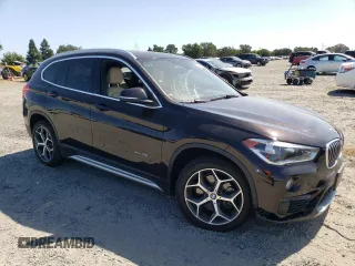 2017 BMW X1 xDrive28i z VIN WBXHT3C32H5F73536, wystawiony jako Copart lot #58431875 z przebiegiem 108 549 mil mil oraz Szkoda całkowita • Salvage title. Historia ofert i sprzedaży dostępna na DreamBid. Obrazek 4.