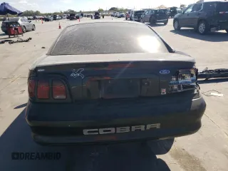 1996 Ford Mustang Cobra with VIN 1FALP47V1TF119779, listed as a Copart auction lot 77640024 with 202,819 mi miles and Salvage Title. Bid and sale history available at carsss.com. Image 6.