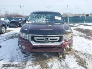 2011 Honda Ridgeline RTL with VIN 5FPYK1F58BB004573, listed as a IAAI auction lot 41576676 with 56,120 mi miles. Bid and sale history available at carsss.com. Image 12.