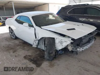 2015 Dodge Challenger SXT with VIN 2C3CDZAG1FH906409, listed as a IAAI auction lot 41776473 with 138,257 mi miles. Bid and sale history available at carsss.com. Image 1.