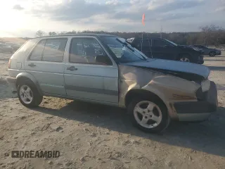 1992 Volkswagen Golf с VIN 3VWFA21G2NM043514, выставлен на аукционе Copart как лот 42501035 с пробегом 267 345 миль миль и Списание • Salvage title. История ставок и продаж доступна на DreamBid. Изображение 4.