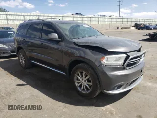 2016 Dodge Durango SXT with VIN 1C4RDJAGXGC415929, listed as a Copart auction lot 52812635 with 202,456 mi miles and Salvage title. Bid and sale history available at DreamBid. Image 4.
