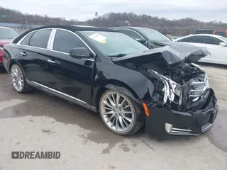 2013 Cadillac XTS Platinum with VIN 2G61V5S37D9194227, listed as a IAAI auction lot 41510449 with 114,243 mi miles. Bid and sale history available at carsss.com. Image 1.