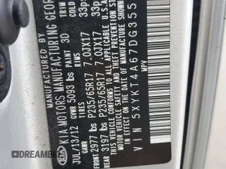 2013 Kia Sorento LX z VIN 5XYKT4A67DG355452, wystawiony jako Copart lot #54902255 z przebiegiem 188 949 mil mil oraz Szkoda całkowita • Salvage title. Historia ofert i sprzedaży dostępna na DreamBid. Obrazek 14.