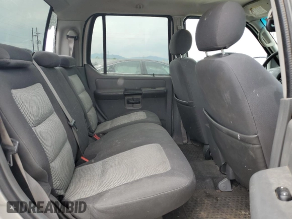 2005 Ford Explorer Sport Trac XLS z VIN 1FMZU77K85UB40868, wystawiony jako Copart lot #59041105 z przebiegiem 213 338 mil mil oraz Szkoda całkowita • Salvage title. Historia ofert i sprzedaży dostępna na DreamBid. Obrazek 10.