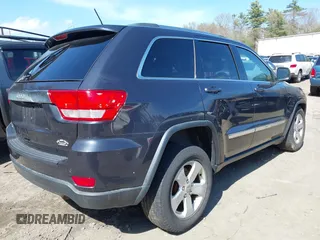 2013 Jeep Grand Cherokee Laredo with VIN 1C4RJFAG1DC592371, listed as a IAAI auction lot 42064993 with 136,154 mi miles. Bid and sale history available at carsss.com. Image 4.