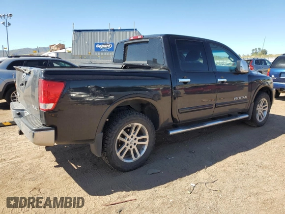 2014 Nissan Titan Pro-4X with VIN 1N6AA0EC2EN519983, listed as a Copart auction lot 71496934 with 150,259 mi miles and Salvage title. Bid and sale history available at DreamBid. Image 3.