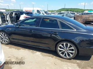 2014 Audi A6 Prestige with VIN WAUHGAFC9EN027338, listed as a IAAI auction lot 42377190 with 164,427 mi miles and . Bid and sale history available at DreamBid. Image 14.