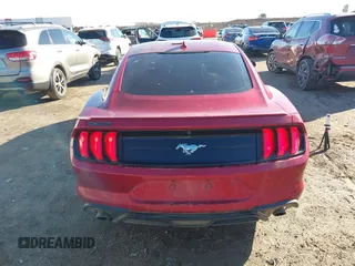 2021 Ford Mustang EcoBoost with VIN 1FA6P8TH8M5129026, listed as a IAAI auction lot 41451125 with 52,018 mi miles. Bid and sale history available at carsss.com. Image 16.