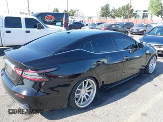 2019 Nissan Maxima SV with VIN 1N4AA6AV0KC379040, listed as a IAAI auction lot 42003805 with 53,724 mi miles and . Bid and sale history available at DreamBid. Image 4.