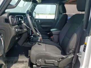 2022 Jeep Wrangler Sport S with VIN 1C4GJXAG5NW259605, listed as a Copart auction lot 57659775 with 14,864 mi miles and Salvage title. Bid and sale history available at DreamBid. Image 7.