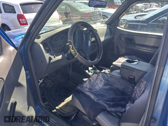 2001 Ford Ranger XL with VIN 1FTYR10UX1TA91831, listed as a IAAI auction lot 42075599 with 201,269 mi miles and . Bid and sale history available at carsss.com. Image 5.