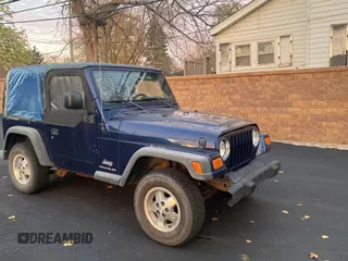 2003 Jeep Wrangler SE with VIN 1J4FA29143P371506, listed as a Copart auction lot 80153184 with 101,513 mi miles and Clean Title. Bid and sale history available at carsss.com. Image 1.