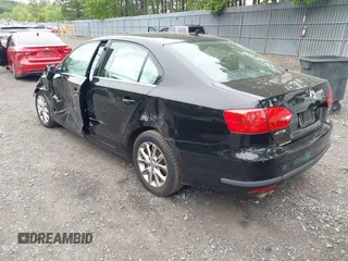 2013 Volkswagen Jetta SE with VIN 3VWDP7AJ7DM212911, listed as a IAAI auction lot 42307323 with 128,745 mi miles and . Bid and sale history available at DreamBid. Image 3.