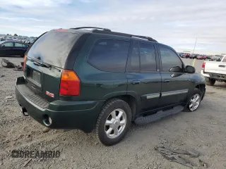 2004 GMC Envoy SLT with VIN 1GKDT13S642185410, listed as a Copart auction lot 72572504 with 136,193 mi miles and Salvage Title. Bid and sale history available at DreamBid. Image 3.