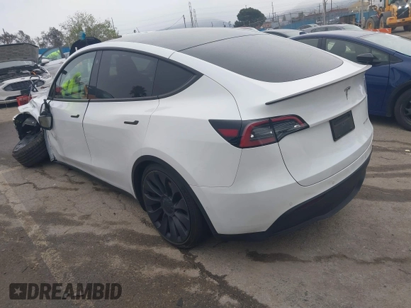 2022 Tesla Model Y Performance with VIN 7SAYGDEF0NF400560, listed as a IAAI auction lot 41783912 with 36,513 mi miles and . Bid and sale history available at DreamBid. Image 3.