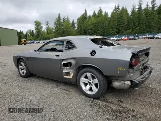 2012 Dodge Challenger SXT Plus z VIN 2C3CDYAG1CH254512, wystawiony jako Copart lot #59034895 z przebiegiem 152 597 mil mil oraz Szkoda całkowita • Salvage title. Historia ofert i sprzedaży dostępna na DreamBid. Obrazek 2.