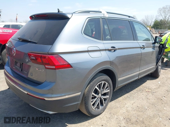 2020 Volkswagen Tiguan SE with VIN 3VV2B7AX4LM074385, listed as a IAAI auction lot 42063842 with 101,092 mi miles and . Bid and sale history available at DreamBid. Image 4.