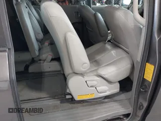 2011 Toyota Sienna XLE AAS z VIN 5TDYK3DC9BS086170, wystawiony jako IAAI lot #42596944 z przebiegiem 156 813 mil mil oraz . Historia ofert i sprzedaży dostępna na DreamBid. Obrazek 21.