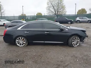 2014 Cadillac XTS Luxury with VIN 2G61M5S36E9248122, listed as a IAAI auction lot 42012167 with 188,458 mi miles and . Bid and sale history available at DreamBid. Image 12.