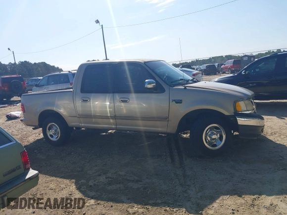2001 Ford F-150 XLT with VIN 1FTRW07W11KD96140, listed as a IAAI auction lot 42331842 with Not provided miles and . Bid and sale history available at DreamBid. Image 13.