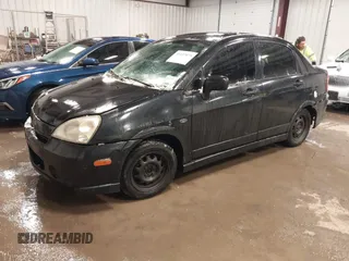 2004 Suzuki Aerio S z VIN JS2RA61S845202185, wystawiony jako IAAI lot #41497079 z przebiegiem 96 925 mil mil oraz . Historia ofert i sprzedaży dostępna na DreamBid. Obrazek 2.