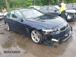 2018 BMW 4 Series 430i xDrive z VIN WBA4J3C5XJBG96766, wystawiony jako IAAI lot #42310906 z przebiegiem 116 189 mil mil oraz . Historia ofert i sprzedaży dostępna na DreamBid. Obrazek 1.