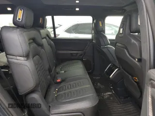 2022 Rivian R1S Launch Edition with VIN 7PDSGABL3NN000739, listed as a Copart auction lot 88127995 with 12,143 mi miles and Salvage Title. Bid and sale history available at DreamBid. Image 11.