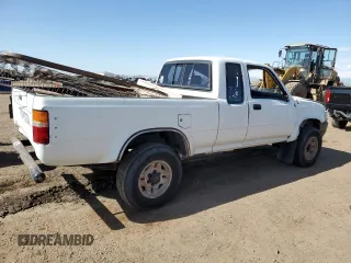 1991 Toyota Pickup DLX z VIN JT4VN13D4M5065504, wystawiony jako Copart lot #54058595 z przebiegiem 108 782 mil mil oraz Tytuł czysty. Historia ofert i sprzedaży dostępna na DreamBid. Obrazek 3.