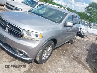 2016 Dodge Durango SXT with VIN 1C4RDHAG8GC330953, listed as a IAAI auction lot 42251138 with 118,604 mi miles and . Bid and sale history available at DreamBid. Image 2.