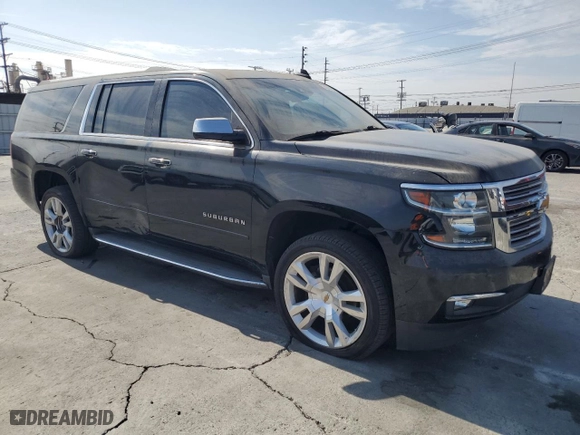 2017 Chevrolet Suburban Premier with VIN 1GNSCJKC0HR140111, listed as a Copart auction lot 74387664 with 104,094 mi miles and Salvage Title. Bid and sale history available at carsss.com. Image 4.