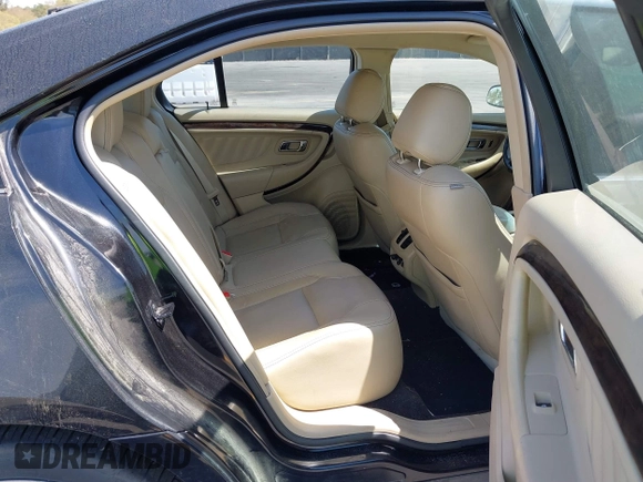 2015 Ford Taurus Limited with VIN 1FAHP2J81FG134973, listed as a IAAI auction lot 41845384 with 139,203 mi miles. Bid and sale history available at carsss.com. Image 8.