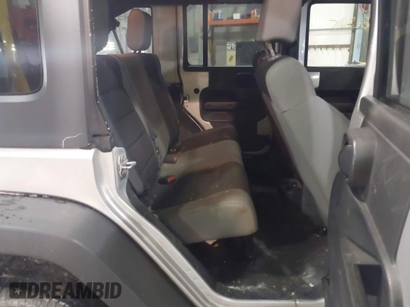 2007 Jeep Wrangler Unlimited X with VIN 1J4GA39167L147516, listed as a IAAI auction lot 41617025 with 119,572 mi miles and . Bid and sale history available at DreamBid. Image 8.
