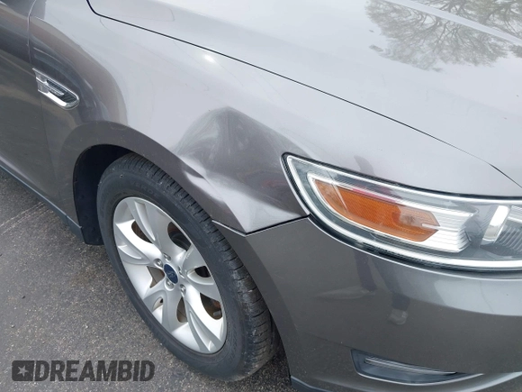 2012 Ford Taurus SEL with VIN 1FAHP2EW4CG107920, listed as a IAAI auction lot 42044023 with 107,696 mi miles and . Bid and sale history available at DreamBid. Image 6.