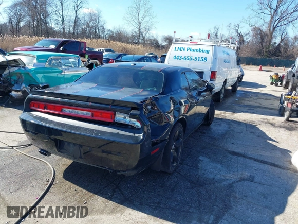 2013 Dodge Challenger R/T with VIN 2C3CDYBT8DH604893, listed as a IAAI auction lot 41585963 with 62,653 mi miles. Bid and sale history available at carsss.com. Image 4.