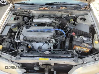 2001 Infiniti G20 Luxury z VIN JNKCP11A01T400404, wystawiony jako Copart lot #69899274 z przebiegiem 243 332 mil mil oraz Szkody całkowita. Historia ofert i sprzedaży dostępna na DreamBid. Obrazek 11.