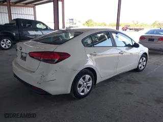 2018 Kia Forte LX with VIN 3KPFK4A74JE168739, listed as a IAAI auction lot 42035326 with 129,415 mi miles. Bid and sale history available at carsss.com. Image 4.