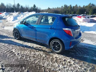 2012 Toyota Yaris L with VIN JTDKTUD31CD504632, listed as a IAAI auction lot 41660676 with 105,789 mi miles. Bid and sale history available at carsss.com. Image 3.