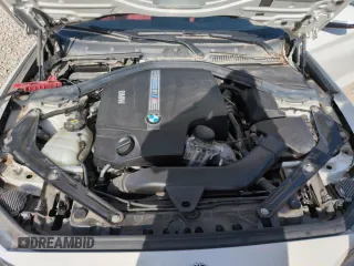 2018 BMW M2 z VIN WBS1J5C59J7B70092, wystawiony jako Copart lot #52558485 z przebiegiem 2 614 mil mil oraz Szkoda całkowita • Salvage title. Historia ofert i sprzedaży dostępna na DreamBid. Obrazek 11.
