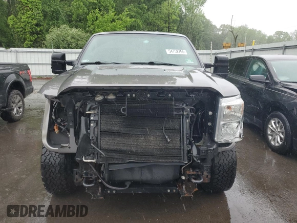 2014 Ford F-250 XL with VIN 1FT7W2B60EEA33908, listed as a Copart auction lot 54752765 with 215,428 mi miles and Salvage title. Bid and sale history available at DreamBid. Image 5.