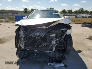 2020 Lexus RX with VIN 2T2HGMDA2LC050011, listed as a Copart auction lot 50695395 with 75,567 mi miles and Salvage Title. Bid and sale history available at carsss.com. Image 5.