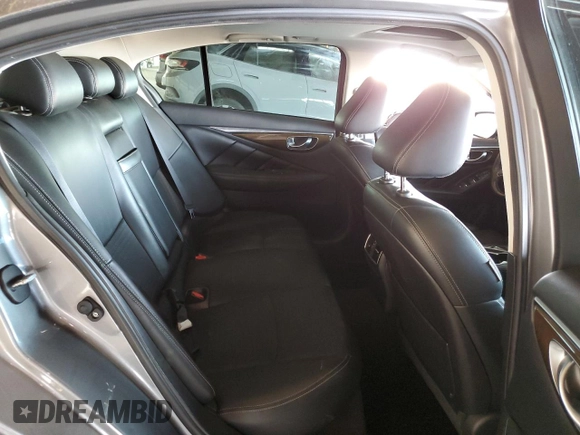 2015 Infiniti Q50 Premium with VIN JN1BV7AP1FM342088, listed as a Copart auction lot 56920195 with 106,585 mi miles and Salvage title. Bid and sale history available at DreamBid. Image 10.