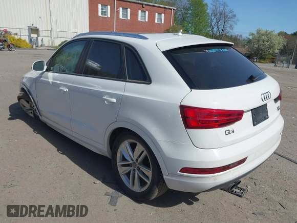 2017 Audi Q3 Premium with VIN WA1ECCFS9HR005867, listed as a IAAI auction lot 42144051 with 87,552 mi miles and . Bid and sale history available at DreamBid. Image 3.