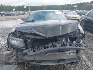 2014 Chevrolet Camaro LT z VIN 2G1FB1E37E9126536, wystawiony jako IAAI lot #42449772 z przebiegiem 172 412 mil mil oraz . Historia ofert i sprzedaży dostępna na DreamBid. Obrazek 6.
