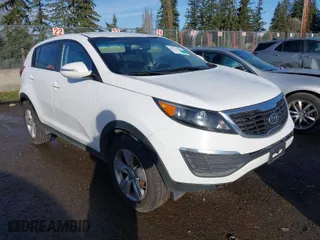 2012 Kia Sportage LX with VIN KNDPB3A24C7317060, listed as a IAAI auction lot 41725826 with 122,574 mi miles. Bid and sale history available at carsss.com. Image 1.