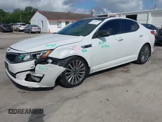 2015 Kia Optima SX Turbo with VIN 5XXGR4A60FG503940, listed as a IAAI auction lot 41944773 with 214,914 mi miles. Bid and sale history available at carsss.com. Image 17.