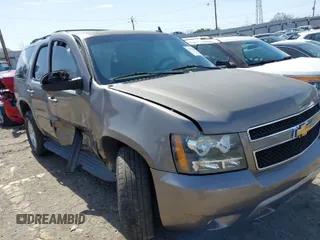 2014 Chevrolet Tahoe LT z VIN 1GNSCBE09ER243918, wystawiony jako IAAI lot #41752684 z przebiegiem 236 727 mil mil oraz . Historia ofert i sprzedaży dostępna na DreamBid. Obrazek 1.