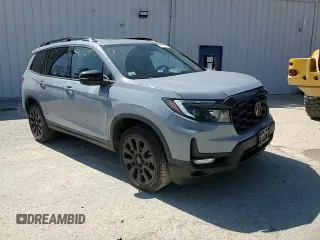 2023 Honda Passport Elite with VIN 5FNYF8H03PB034613, listed as a Copart auction lot 54009215 with 102,841 mi miles and Salvage title. Bid and sale history available at DreamBid. Image 14.
