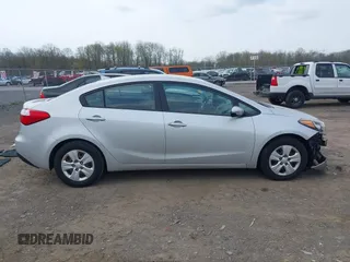 2015 Kia Forte LX with VIN KNAFK4A66F5390206, listed as a IAAI auction lot 42146355 with 107,925 mi miles. Bid and sale history available at carsss.com. Image 13.